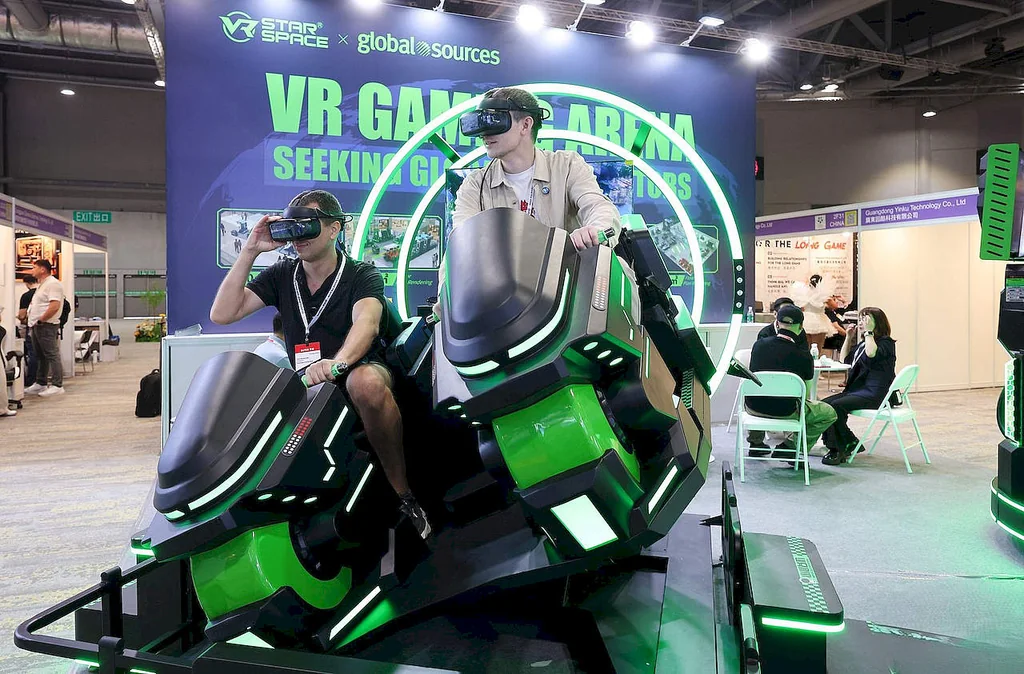 Visitors using VR simulators at the VR immersive experience zone presented with VR Star Space